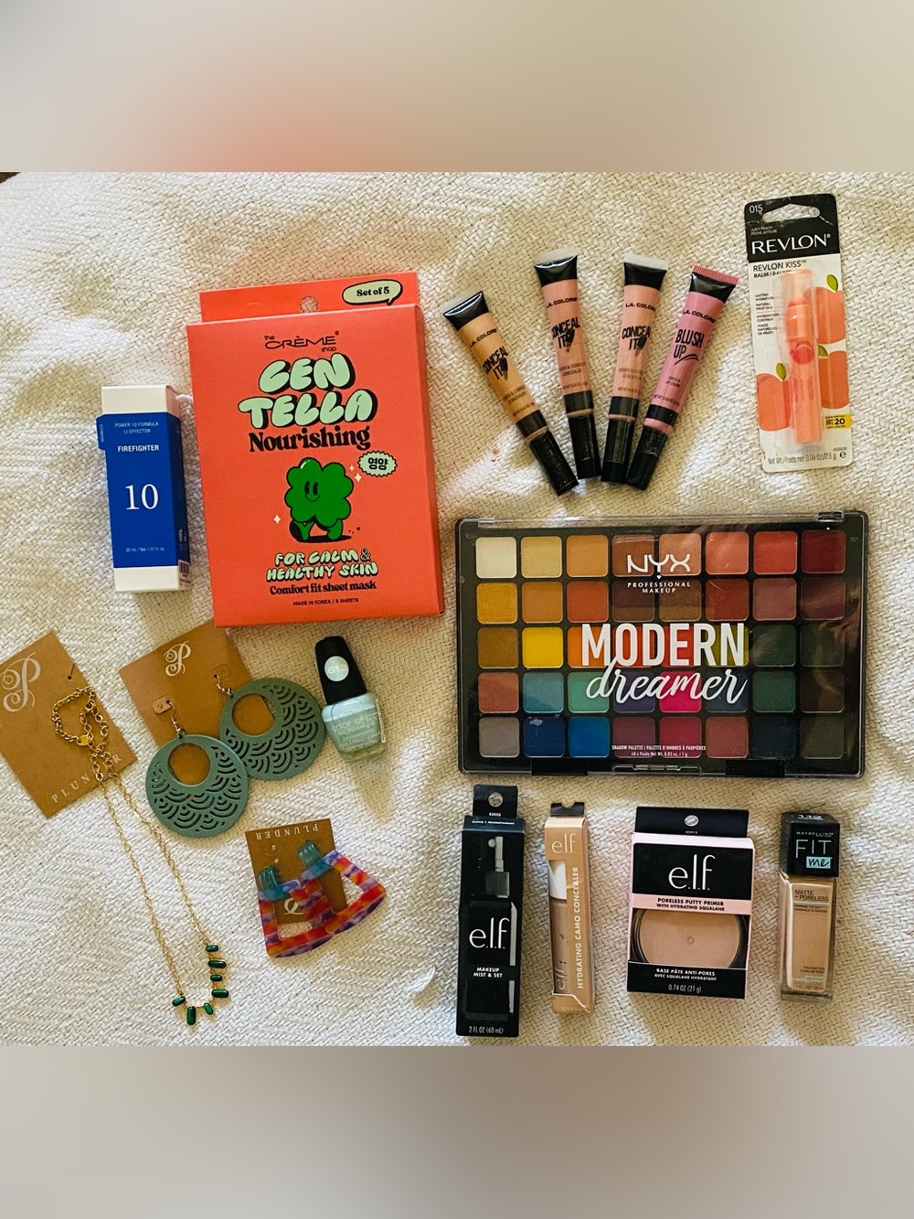 Bundle of NYX Modern Dreamer Eyeshadow Palette, with other makeup products
